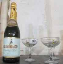 Two 75cl bottles of Babysham and three glasses