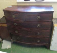 A bow front chest of two short and three long drawers