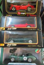 A Burrago Viper, Maisto Corvette, Maisto Jaguar and Aston Martin DBR1 all boxed