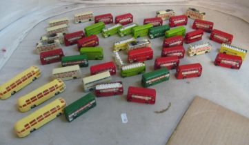 A group of Lesney buses and three plastic coaches