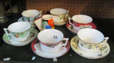 A Wedgwood Clarice Cliff collection jug and six Wedgwood Georgian collection cups and saucers