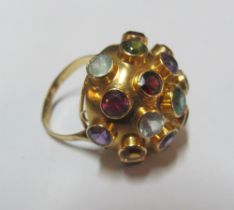A cluster ring with various coloured stones, size M/N