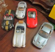 A Burrago Viper (damaged paintwork), Aston Martin, Ferrari, Shelby and Mercedes