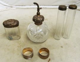 Two silver napkins, silver top bottles and scent bottle