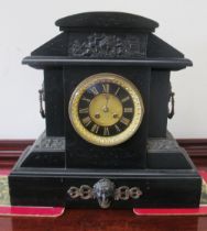 A Victorian large black slate mantel clock with gilt panel of cherubs and other details