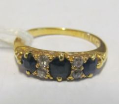 An 18ct gold sapphire and diamond ring 3.5g size M