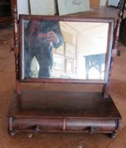 A 19th Century swing mirror with two drawers