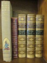 A set of three leather bindings and two books