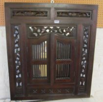 An Indonesian mirror with fold out doors