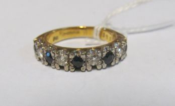 An 18ct gold half-hoop illusion set sapphire and diamond ring 4.4g size K