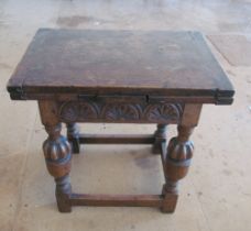An oak drawleaf occasional table and another oak table