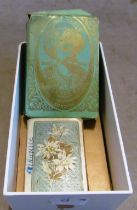 An unopened pack of de la Rue Coronation of Edward VII playing cards and two other packs