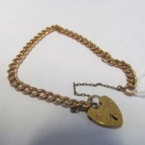 A 9ct rose gold bracelet with yellow gold padlock clasp 15.1g