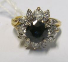 An 18ct sapphire and diamond cluster ring, size O 7.1g