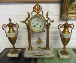 A three piece clock garniture