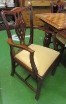 A set of eight Chippendale style chairs