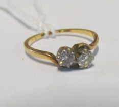 An 18ct gold and diamond crossover ring 1.4g size I