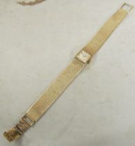 A gold Omega watch