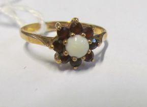 A 9ct gold opal and garnet ring 1.7g size N