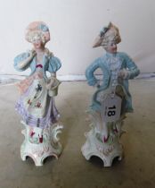 A pair of Edwardian porcelain figures lady and gentleman