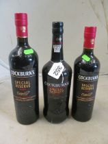 Two bottles Cockburns Special Reserve Port and another