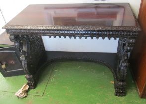 A carved Burmese hall table