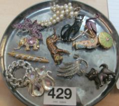 A pearl leaf design brooch marked 14k, various cat and other brooches