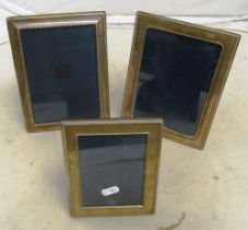 Three silver photo frames