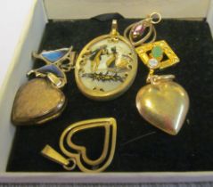 Two 9ct gold pendants and other pendants