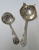A Scottish silver strainer and matching caddy spoon 2oz