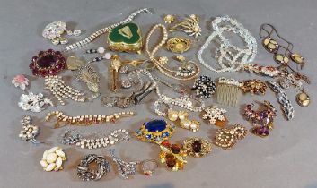 A collection of jewellery to include brooches, watches and necklaces