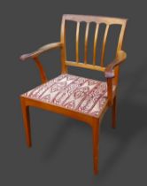 A Barnsley workshop line inlaid armchair, with shaped arms, drop in seat and square tapering legs
