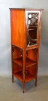 An Art Nouveau Mahogany Cabinet with a glazed door above two open shelves, 36cms wide, 40cms deep,