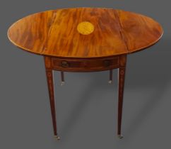 A 19th Century inlaid oval Pembroke table, the shell inlaid top above square tapering legs, 77cms