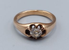 A yellow metal solitaire diamond set Gypsy ring, the single diamond claw set, approx. 0.40ct