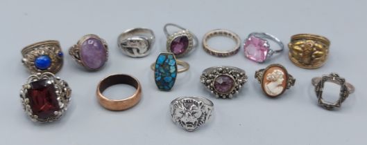 A collection of mainly silver dress rings