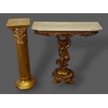 A French gilded console table with a marble top above a figural column together with a gilded