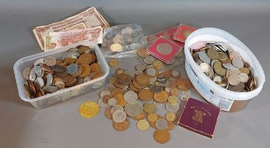 A coin collection, both British and Foreign, together with a small collection of bank notes