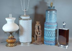 A blue and white porcelain table lamp of cylindrical form, together with three other lamps and an