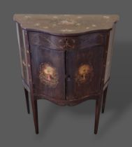 A Sheraton revival small commode of serpentine form, the hinged top enclosing divided interior and