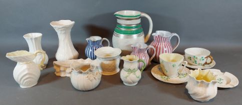A Radford jug together with three Rye pottery jugs and a collection of Belleek