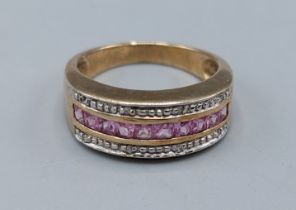 A 9ct gold dress ring set with Diamonds and pink stone, 3.4gms, ring size L