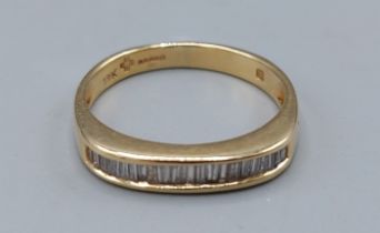 An 18ct gold Baguette Diamond half Eternity ring, 3.9gms, ring size P