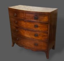 A 19th Century mahogany bow front chest of two short and three long drawers with oval handles raised