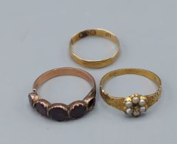 A 19th Century Pearl set dress ring together with an Amethyst set dress ring and a 15ct gold wedding