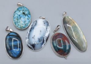 A 925 silver pendent mounted with hardstone, together with four other similar pendants