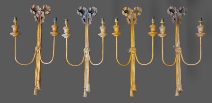 A set of four two branch wall lights, 58cms long