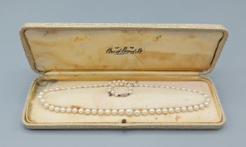 A pearl necklace by Ciro with 9ct gold clasp, 49cms long