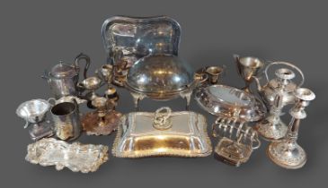 A silver plated rollover entree dish together with a collection of silver plated items