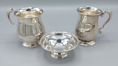 A London silver christening mug together with a Birmingham silver christening mug and a Birmingham